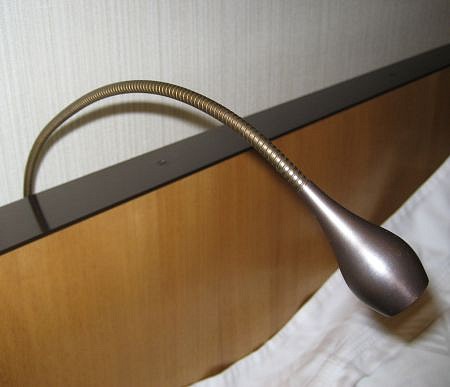 Viabizzuno, Two (2) "Toccami" Reading Lights
2008, weathered brass